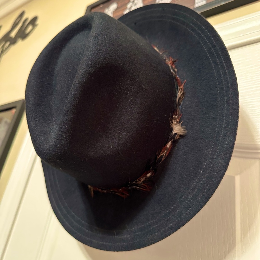 Black hat with feathers